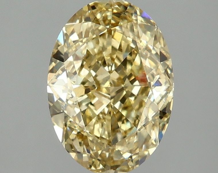 Loose Diamond - OVAL 2.01ct Fancy Intense Yellow VS2: Loose Diamond - OVAL 2.01ct Fancy Intense Yellow VS2 Source: This is a real non-mined Diamond that has been grown in a lab Shape: OVAL Carats: 2.01 Color: Fancy Intense Yellow Certification: IGI Video