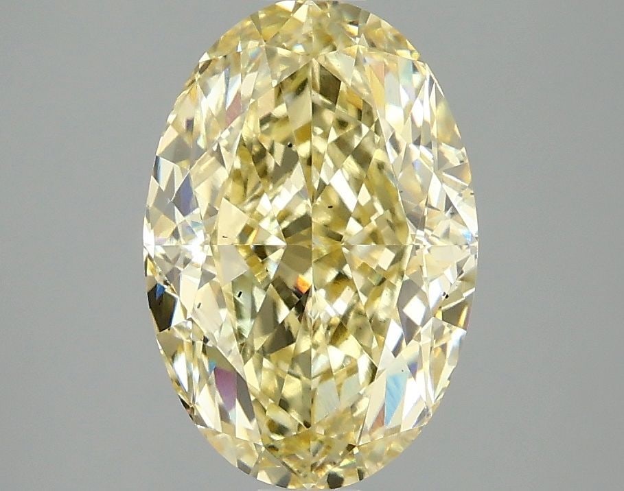 Loose Diamond - OVAL 3.02ct Fancy Intense Yellow VS2: Loose Diamond - OVAL 3.02ct Fancy Intense Yellow VS2 Source: This is a real non-mined Diamond that has been grown in a lab Shape: OVAL Carats: 3.02 Color: Fancy Intense Yellow Certification: IGI Video