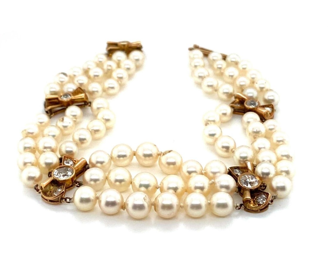Mikimoto Akoya Pearl Triple Strand Bracelet with Diamonds 14k Gold: Mikimoto Akoya Pearl Triple Strand Bracelet with Diamonds 14k Gold Vintage Mikimoto triple-strand bracelet featuring graduated cultured Akoya pearls and a diamond-set clasp in 14k yellow gold. This si