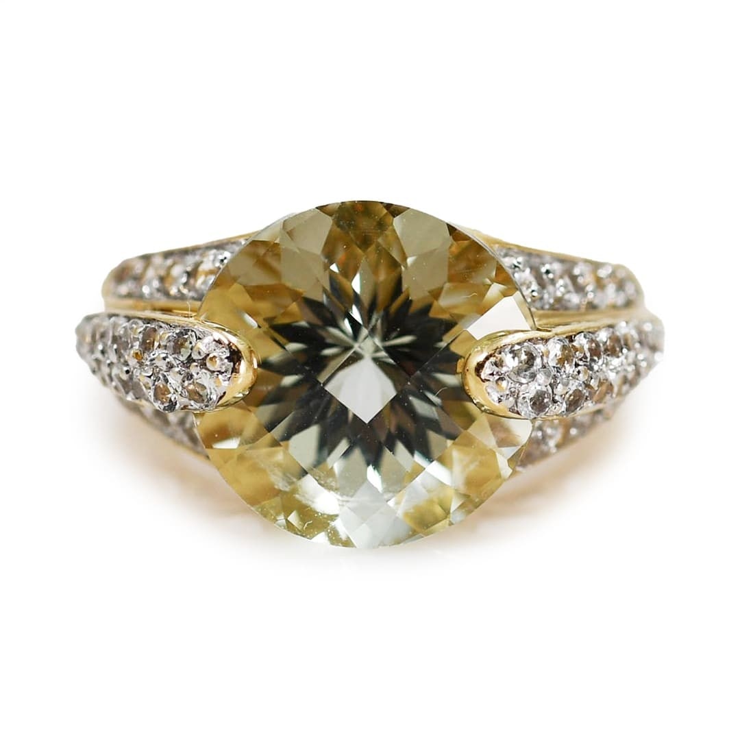 Unbranded Prasiolite White Topaz 14K Yellow Gold Ring Size 6 7.5 tcw: Unbranded Prasiolite White Topaz 14K Yellow Gold Ring Size 6 7.5 tcw Ladies designer style ring featuring a light green prasiolite accented by white topaz in a 14k yellow gold setting. The center pras