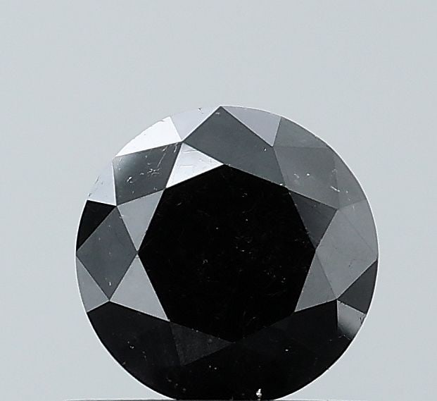 Loose Diamond - ROUND 0.79ct Fancy Black VVS2: Loose Diamond - ROUND 0.79ct Fancy Black VVS2 Source: Natural Shape: ROUND Carats: 0.79 Color: Fancy Black Certification: NONE Video: