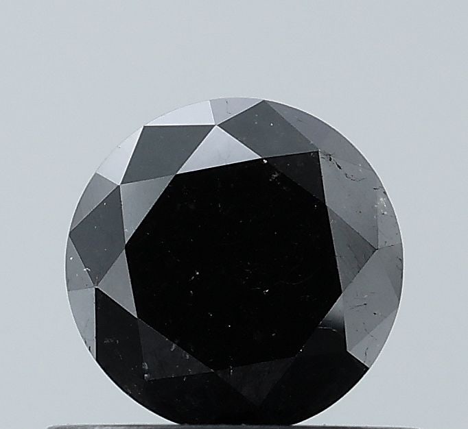 Loose Diamond - ROUND 0.62ct Fancy Black VS2: Loose Diamond - ROUND 0.62ct Fancy Black VS2 Source: Natural Shape: ROUND Carats: 0.62 Color: Fancy Black Certification: NONE Video:
