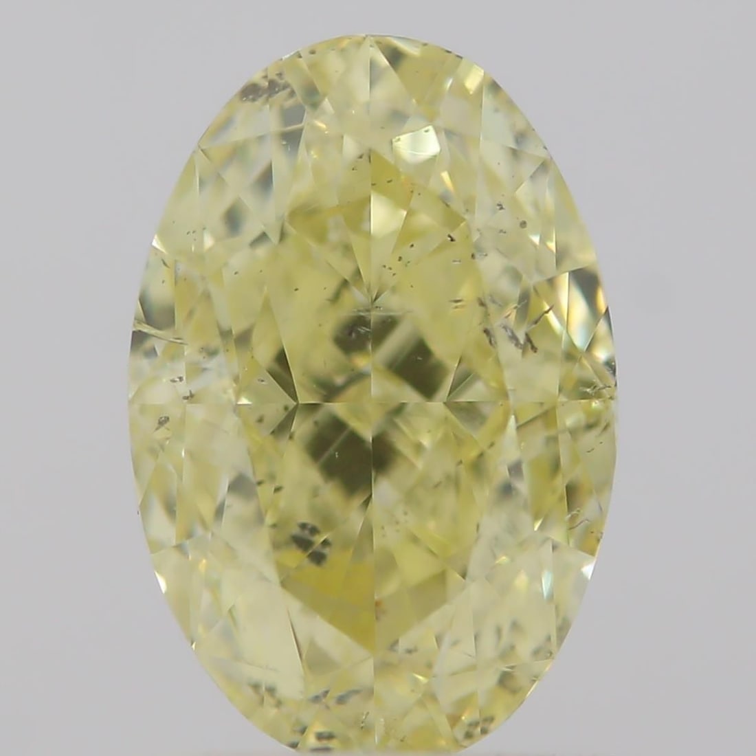 Loose Diamond - OVAL 1.05ct Fancy Yellow SI2: Loose Diamond - OVAL 1.05ct Fancy Yellow SI2 Source: Natural Shape: OVAL Carats: 1.05 Color: Fancy Yellow Certification: GIA Video: