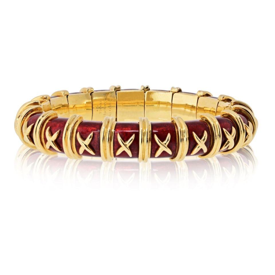 Schlumberger Croisillon Red Enamel 18K Gold Bracelet by Tiffany & Co.: Schlumberger Croisillon Red Enamel 18K Gold Bracelet by Tiffany & Co. This Tiffany & Co. Schlumberger Croisillon bracelet is crafted from 18K yellow gold and features vibrant red enamel accents in the