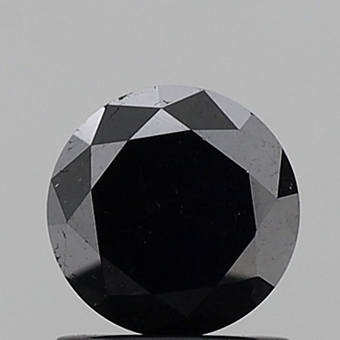 Loose Diamond - ROUND 1.2ct Black VVS2: Loose Diamond - ROUND 1.2ct Black VVS2 Source: Natural Shape: ROUND Carats: 1.2 Color: Black Certification: NONE Video: