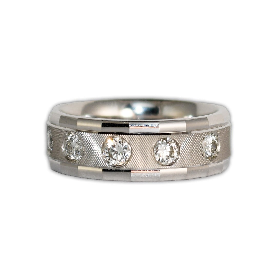 Unbranded 14K White Gold Diamond Band Ring 0.50 ctw Size 7: Unbranded 14K White Gold Diamond Band Ring 0.50 ctw Size 7 Pre-owned ladies' 14k white gold diamond band with a textured center finish and five round brilliant natural diamonds. This ring has a substa