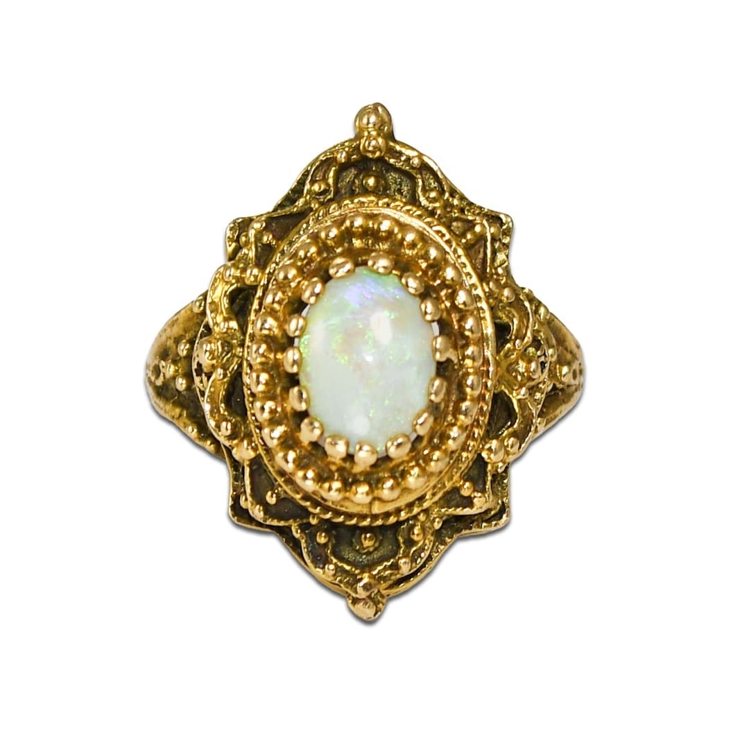 Vintage 13k Yellow Gold Cocktail Ring with Oval Opal 6.8g: Vintage 13k Yellow Gold Cocktail Ring with Oval Opal 6.8g Vintage ladies cocktail ring crafted in 13k yellow gold and set with a natural oval opal. The opal shows green flashes with some blue and is o