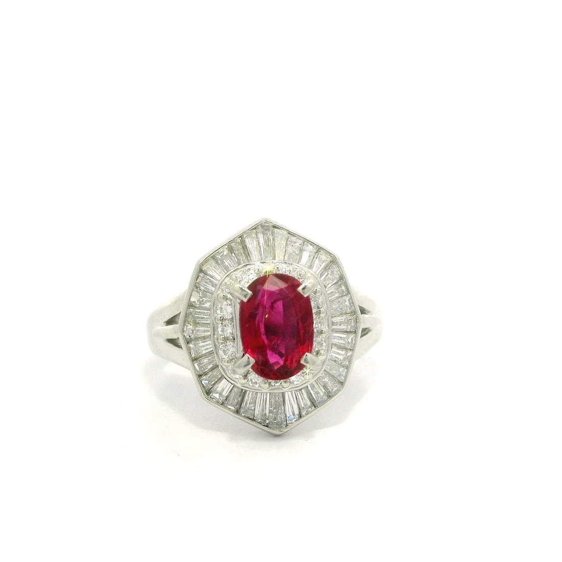 Platinum GIA Certified 2.22ct No Heat Oval Ruby Diamond Halo Ring: Platinum GIA Certified 2.22ct No Heat Oval Ruby Diamond Halo Ring This exquisite cocktail ring showcases a stunning natural oval ruby, weighing 1.02ct, with a captivating red hue and no heat treatment