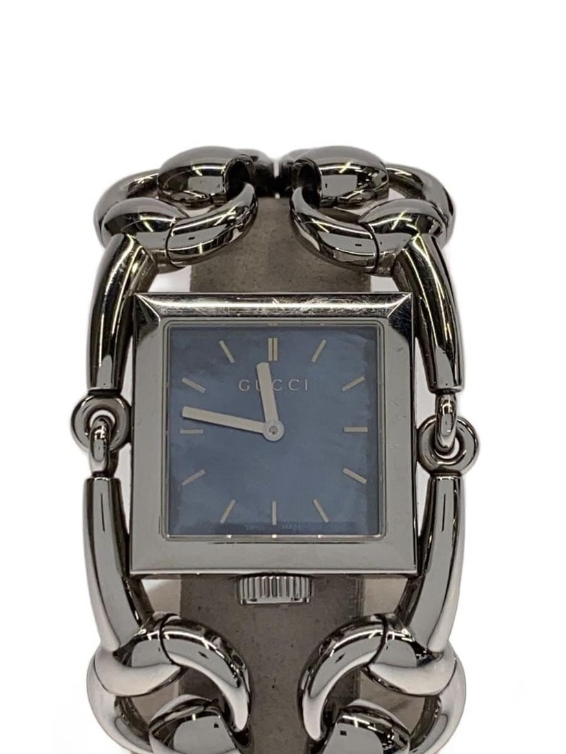 Gucci Signoria Blue Stainless Steel Women's Quartz Watch: Gucci Signoria Blue Stainless Steel Women's Quartz Watch This GUCCI Signoria Quartz 116.3 women's wristwatch features a blue dial and a stainless steel case and band. The watch is Swiss-made and desig