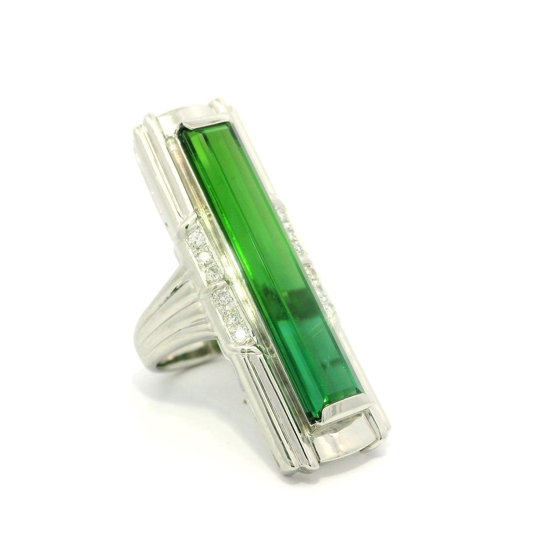 Platinum GIA Certified 9.03ct Green Tourmaline Diamond Cocktail Ring: Platinum GIA Certified 9.03ct Green Tourmaline Diamond Cocktail Ring This exquisite cocktail ring features a stunning natural green tourmaline, expertly cut in a long rectangular shape and channel set