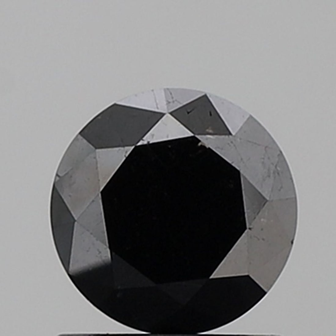 Loose Diamond - ROUND 1.16ct Fancy Black VVS2: Loose Diamond - ROUND 1.16ct Fancy Black VVS2 Source: Natural Shape: ROUND Carats: 1.16 Color: Fancy Black Certification: NONE Video: