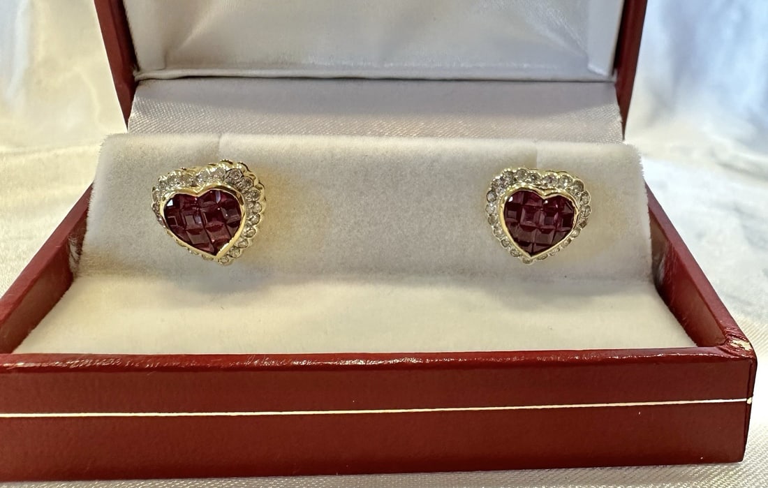 Heart Shaped Platinum 18k Gold Earrings with Diamonds and Synthetic Rubies: Heart Shaped Platinum 18k Gold Earrings with Diamonds and Synthetic Rubies This elegant pair of French dangle earrings is crafted from platinum and 18k gold, featuring synthetic ruby heart-shaped acce