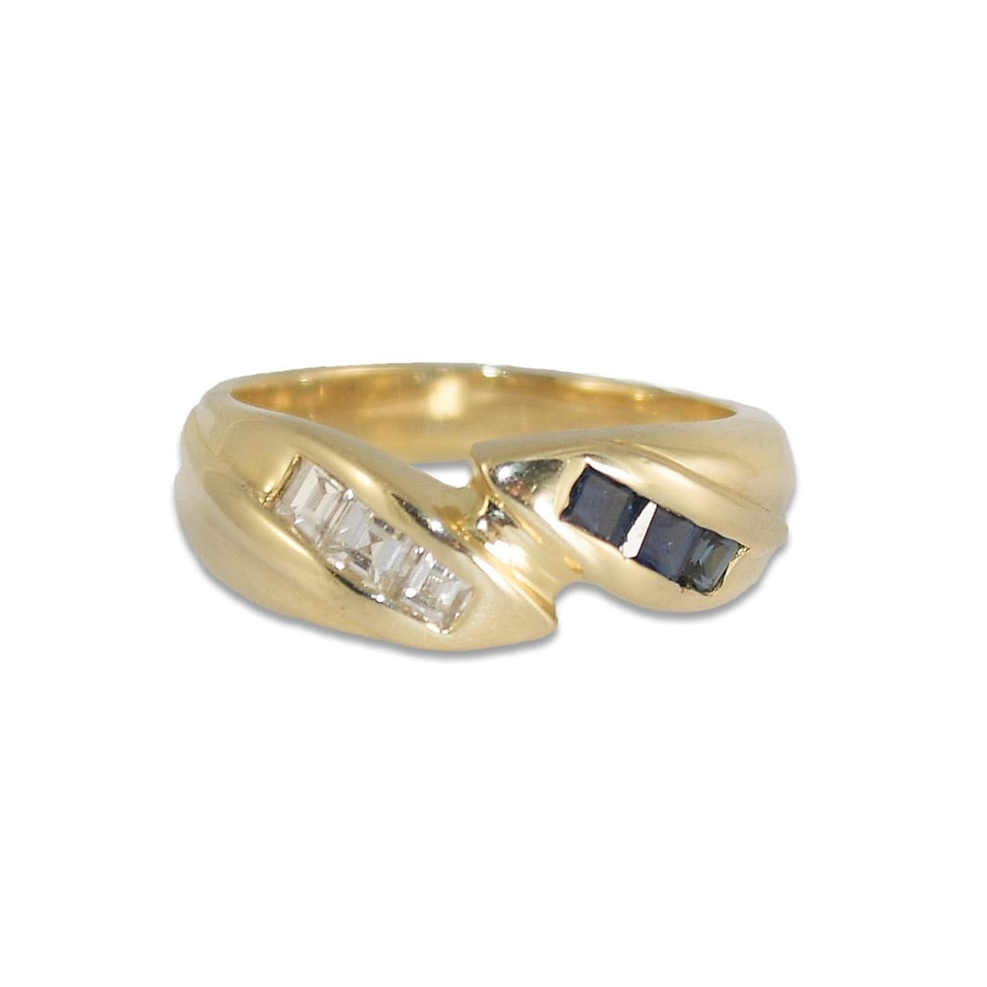 Unbranded 14K Yellow Gold Ring with Blue Stones and 3 Diamond Accents: Unbranded 14K Yellow Gold Ring with Blue Stones and 3 Diamond Accents Pre-owned 14k yellow gold band ring set with emerald-cut diamonds and blue accent gemstones. The ring is stamped 14k and is in exc