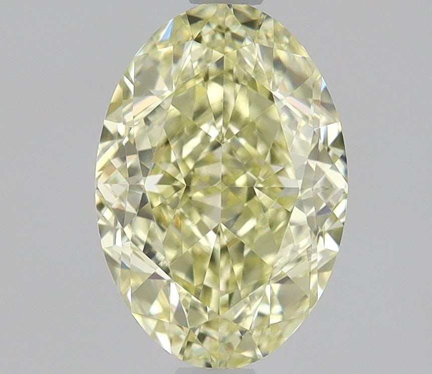 Loose Diamond - OVAL 1.05ct Fancy Yellow VVS1: Loose Diamond - OVAL 1.05ct Fancy Yellow VVS1 Source: Natural Shape: OVAL Carats: 1.05 Color: Fancy Yellow Certification: GIA The Diamond Depot Guarantee: All items in this auction are guaranteed to b