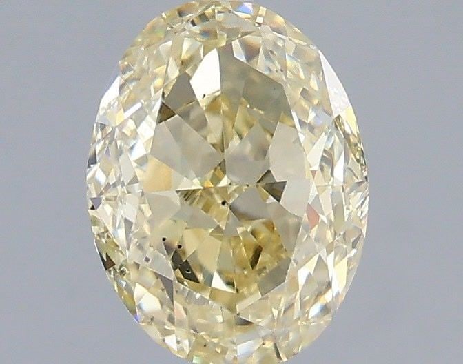 Loose Diamond - OVAL 1.5ct Fancy Yellow SI1: Loose Diamond - OVAL 1.5ct Fancy Yellow SI1 Source: Natural Shape: OVAL Carats: 1.5 Color: Fancy Yellow Certification: GIA Video: