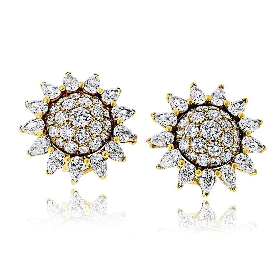 Vintage Starburst Diamond Earrings in 18K Yellow Gold Signed Cartier Paris: Vintage Starburst Diamond Earrings in 18K Yellow Gold Signed Cartier Paris These vintage Cartier starburst cluster earrings are crafted in 18K yellow gold and date to the 1950s. Each earring features 