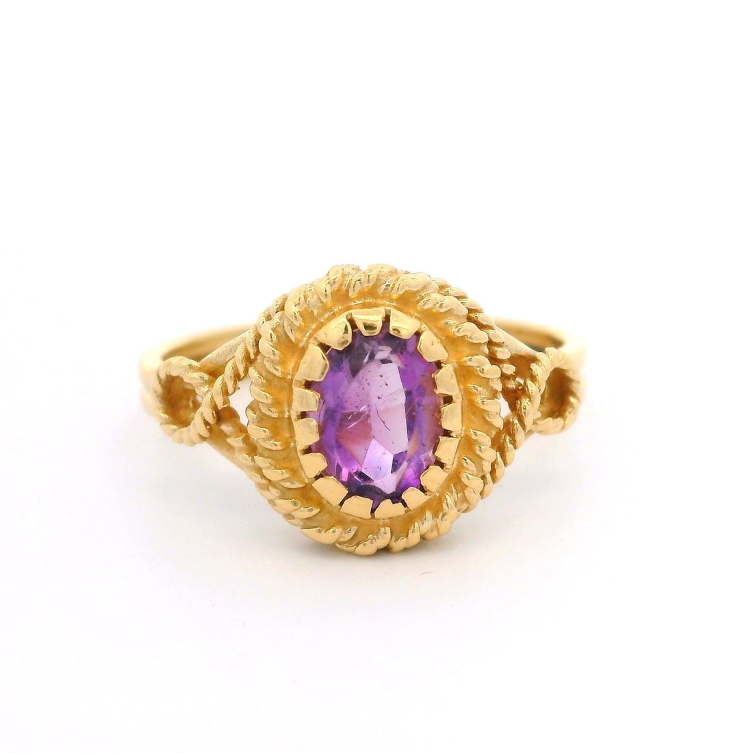 Vintage 14k Yellow Gold Amethyst Cocktail Ring with Twisted Rope Design: Vintage 14k Yellow Gold Amethyst Cocktail Ring with Twisted Rope Design This exquisite vintage ring features a stunning natural genuine amethyst, beautifully crafted in solid 14k yellow gold. The oval