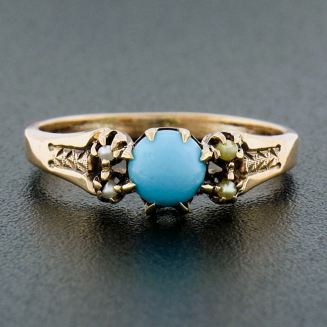 Victorian 9k rose gold turquoise cabochon ring with seed pearls: Victorian 9k rose gold turquoise cabochon ring with seed pearls This antique Victorian ring is crafted from 9k solid rose gold and features a 5mm round cabochon natural turquoise as the centerpiece, a