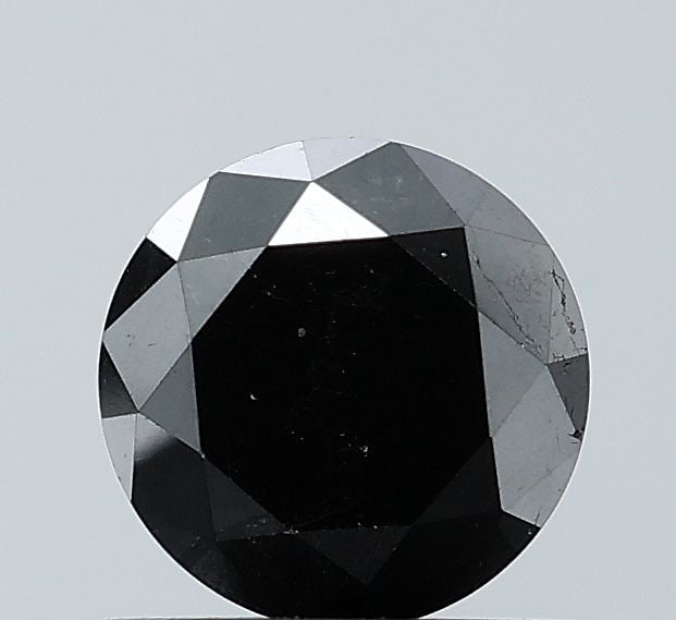 Loose Diamond - ROUND 0.94ct Fancy Black VS1: Loose Diamond - ROUND 0.94ct Fancy Black VS1 Source: Natural Shape: ROUND Carats: 0.94 Color: Fancy Black Certification: NONE Video: