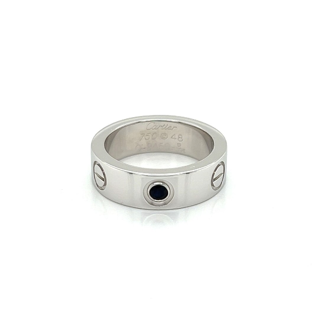 Cartier Love Band Ring 18k White Gold Black Sapphire Size 48 Cert: Cartier Love Band Ring 18k White Gold Black Sapphire Size 48 Cert Pre-owned Cartier Love band ring in 18k white gold from the Love collection, featuring a natural black sapphire accent and the signatu