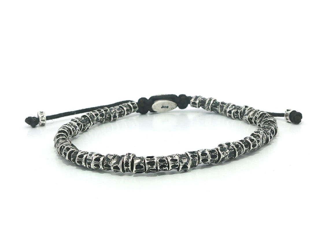 M. Cohen sterling silver pull cord bead bracelet: M. Cohen sterling silver pull cord bead bracelet This pull bracelet features sterling silver beads strung on a durable black cord, offering a stylish and versatile accessory suitable for unisex adults