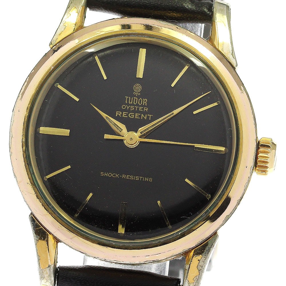 TUDOR Oyster 7959 mens wristwatch manual wind black dial aftermarket strap: TUDOR Oyster 7959 mens wristwatch manual wind black dial aftermarket strap Pre-owned TUDOR Oyster reference 7959 men's wristwatch with a hand-wound movement and black dial. This watch features an SS/G