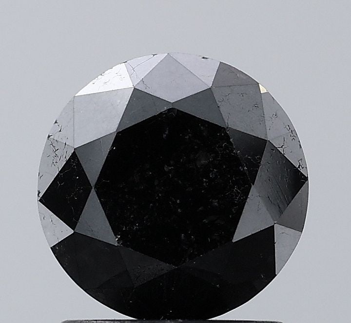 Loose Diamond - ROUND 1.79ct Fancy Black VS2: Loose Diamond - ROUND 1.79ct Fancy Black VS2 Source: Natural Shape: ROUND Carats: 1.79 Color: Fancy Black Certification: NONE Video: