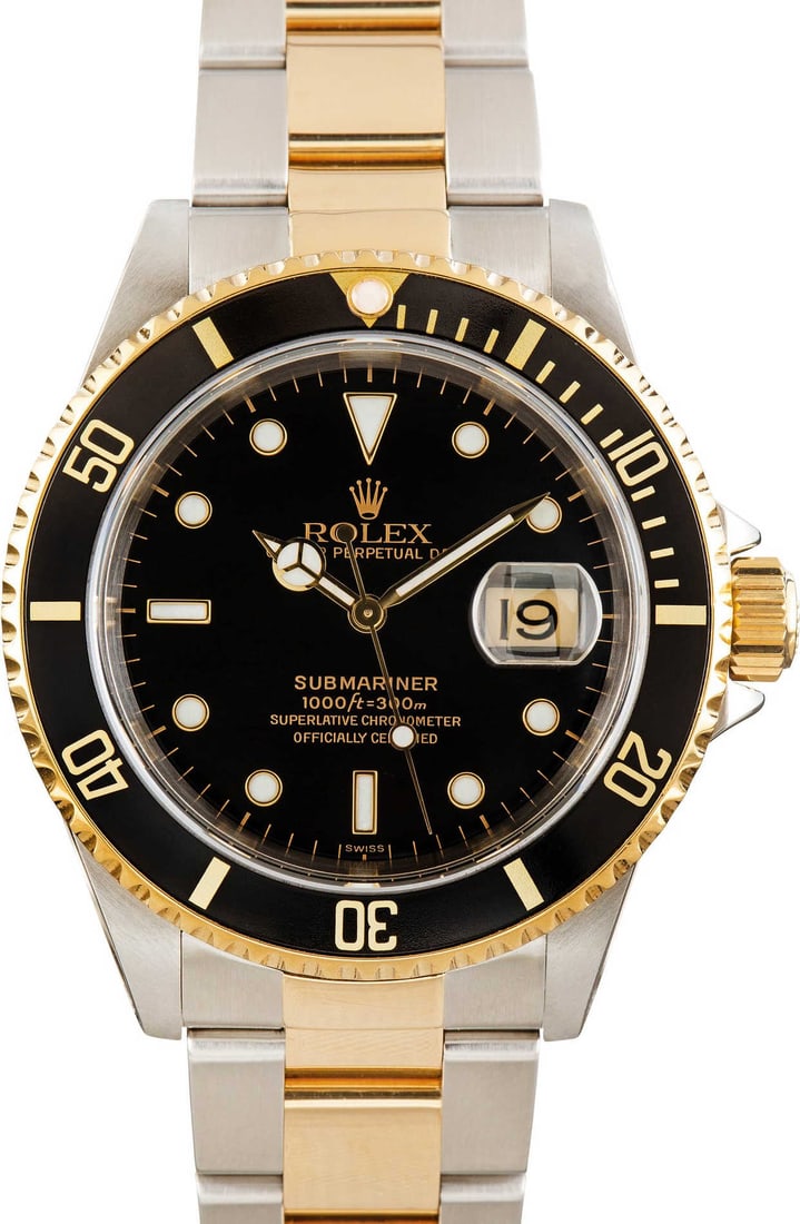Rolex Submariner 16613 Black Dial Men's Watch Oyster Bracelet With Papers 1990: Rolex Submariner 16613 Black Dial Men's Watch Oyster Bracelet With Papers 1990 This Rolex Submariner features a black dial and an aluminum bezel, complemented by an Oyster bracelet. It comes with pape