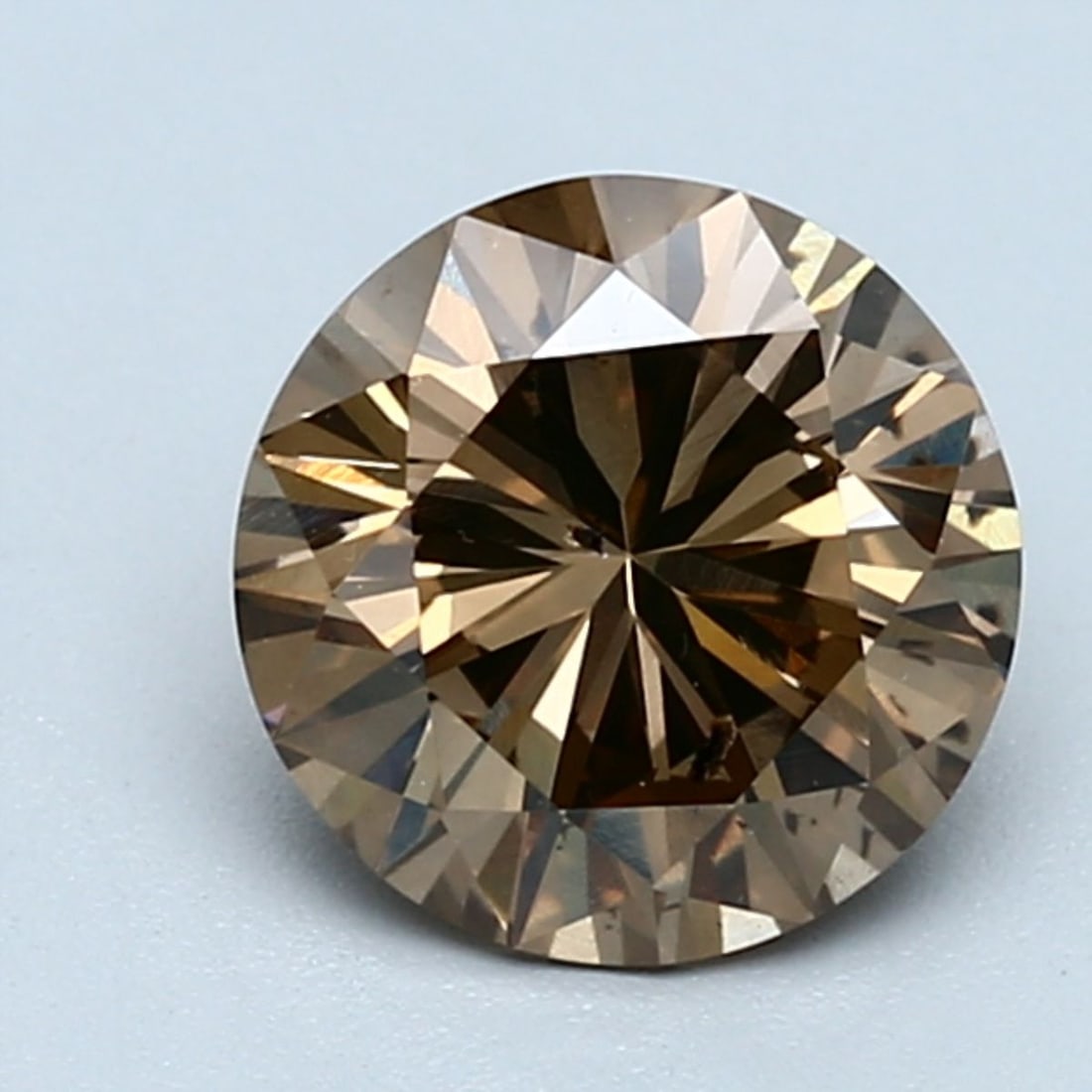 Loose Diamond - ROUND 1.73ct Fancy Yellow Brown SI2: Loose Diamond - ROUND 1.73ct Fancy Yellow Brown SI2 Source: Natural Shape: ROUND Carats: 1.73 Color: Fancy Yellow Brown Certification: GIA The Diamond Depot Guarantee: All items in this auction are gu