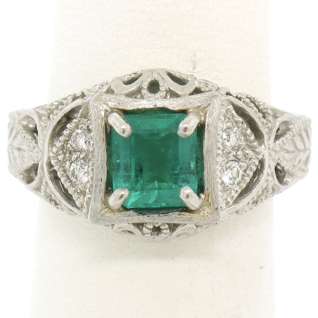 Platinum 1.04ct Radiant Emerald Diamond Filigree Cocktail Ring Size 5.5: Platinum 1.04ct Radiant Emerald Diamond Filigree Cocktail Ring Size 5.5 This exquisite cocktail ring is crafted in solid platinum and features a stunning prong set radiant cut emerald at its center, w