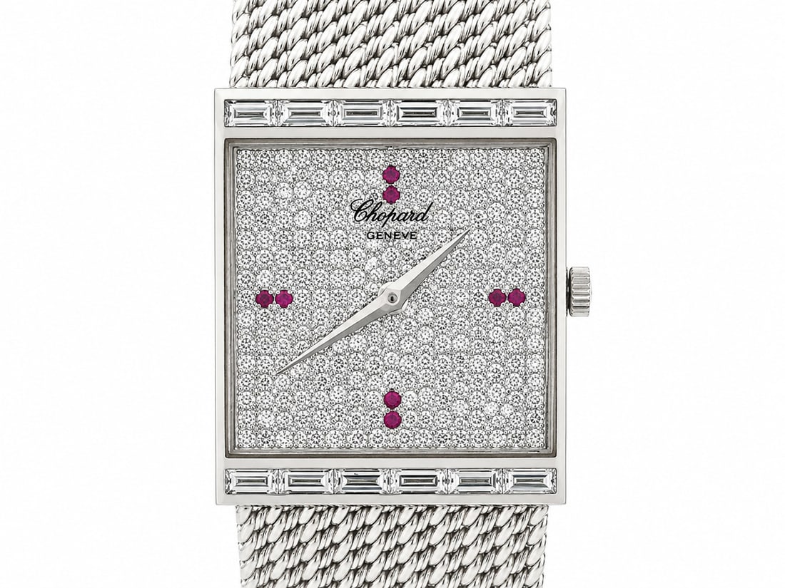 Chopard 22mm Rectangular Diamond Wristwatch in 18k White Gold: Chopard 22mm Rectangular Diamond Wristwatch in 18k White Gold Vintage Chopard rectangular wristwatch with a diamond bezel and analog 12-hour dial. This pre-owned unisex watch features a Swiss quartz m
