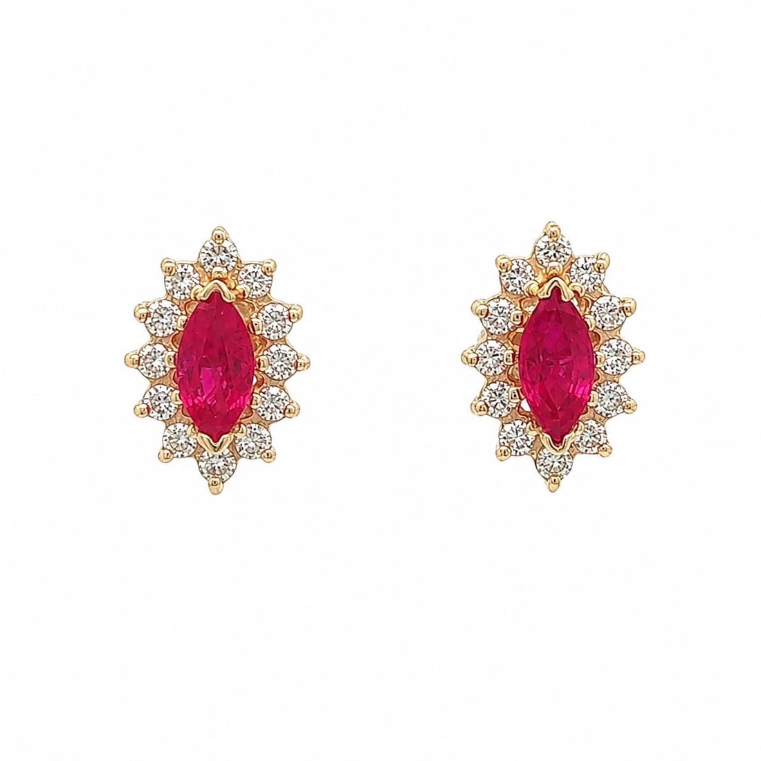 Unbranded 14k Yellow Gold Ruby Diamond Halo Marquise Stud Earrings: Unbranded 14k Yellow Gold Ruby Diamond Halo Marquise Stud Earrings A pair of pre-owned stud earrings crafted in solid 14k yellow gold, featuring two natural marquise-cut rubies in a rich vivid red col