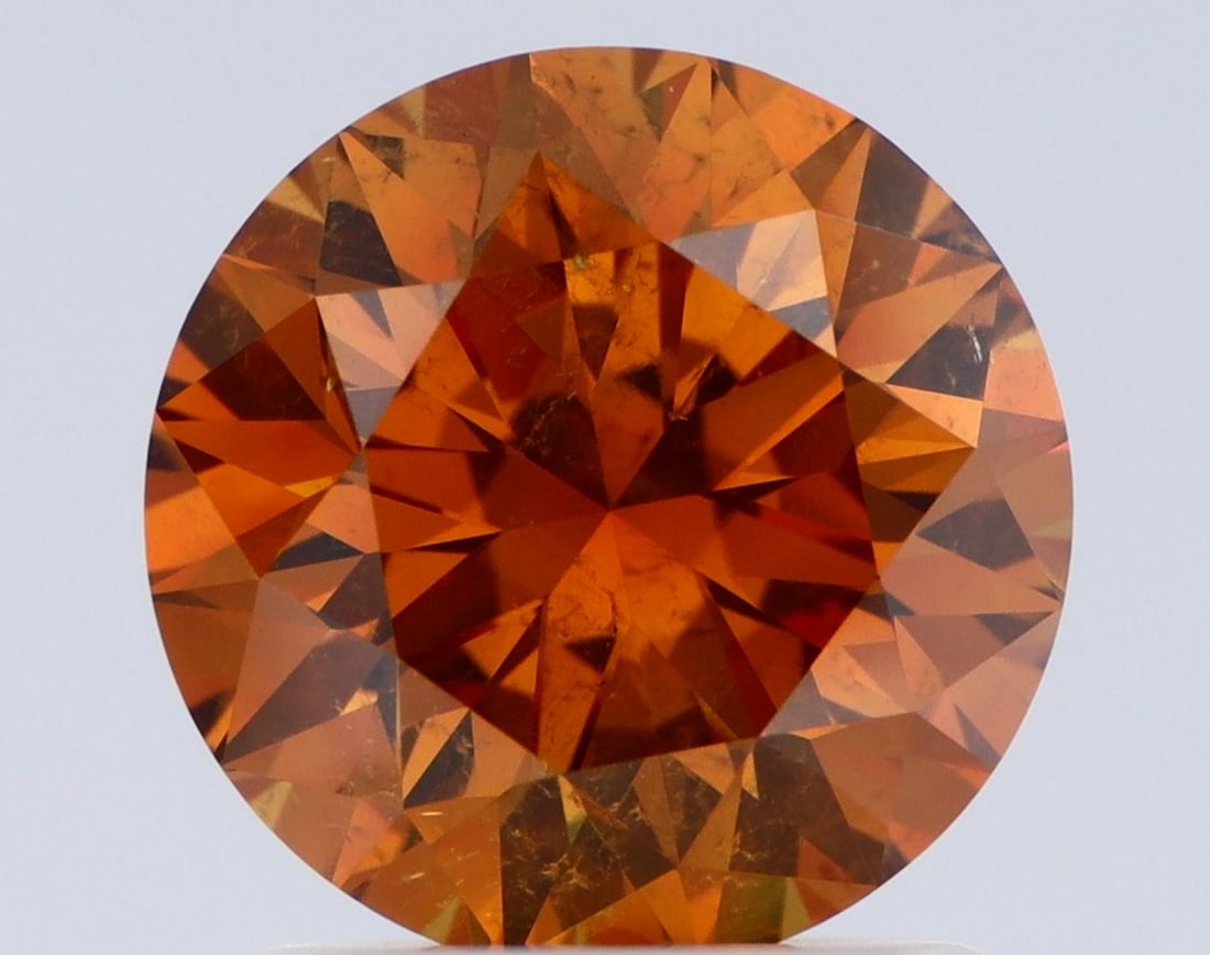 Loose Diamond - ROUND 1.59ct Fancy Deep Yellow Orange I1: Loose Diamond - ROUND 1.59ct Fancy Deep Yellow Orange I1 Source: Natural Shape: ROUND Carats: 1.59 Color: Fancy Deep Yellow Orange Certification: GIA Video: