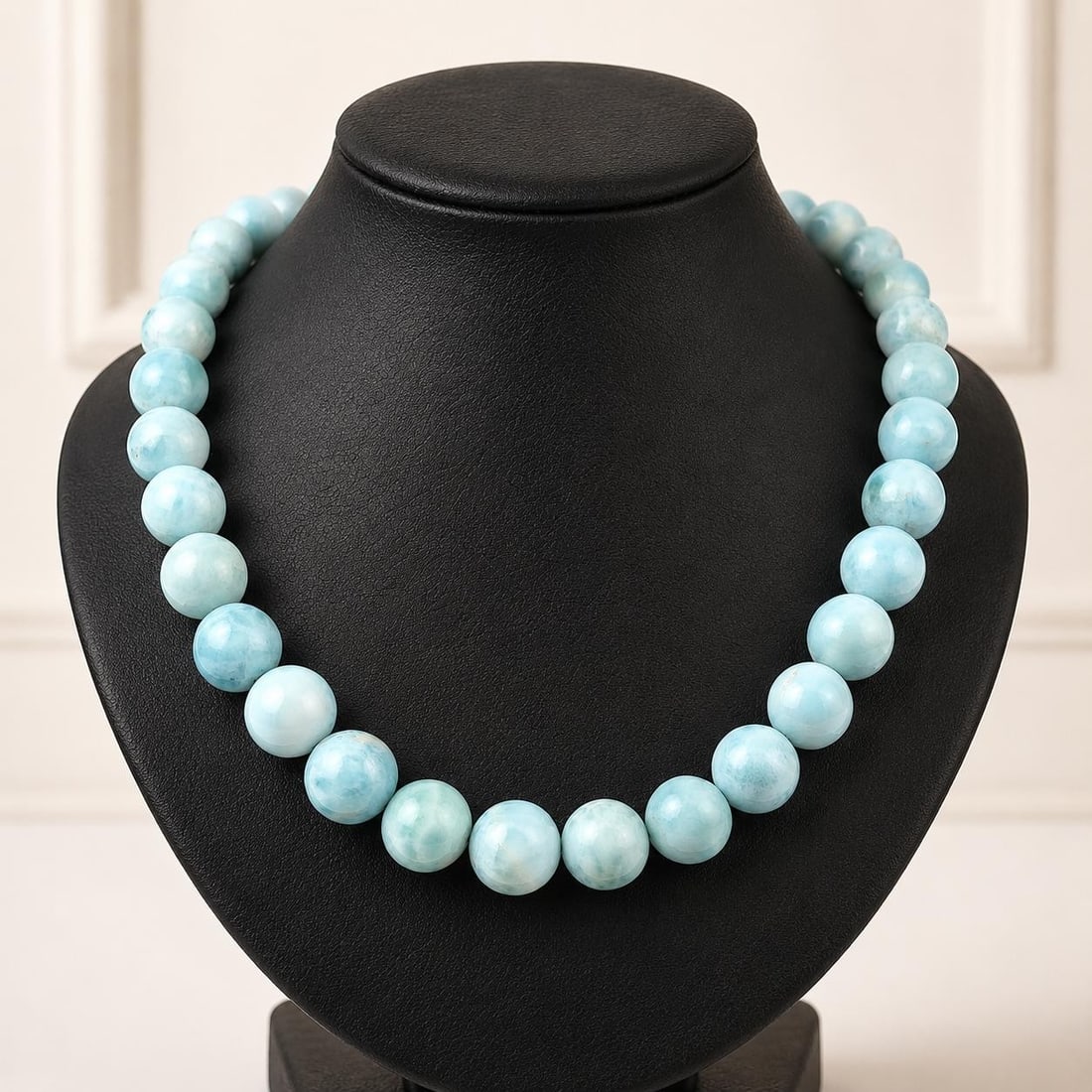 Unbranded Larimar Bead Strand Necklace 15in 18k Yellow Gold Clasp: Unbranded Larimar Bead Strand Necklace 15in 18k Yellow Gold Clasp Graduated strand necklace featuring natural genuine Larimar round beads in a marbled ocean blue color. The beads are strung with a sol