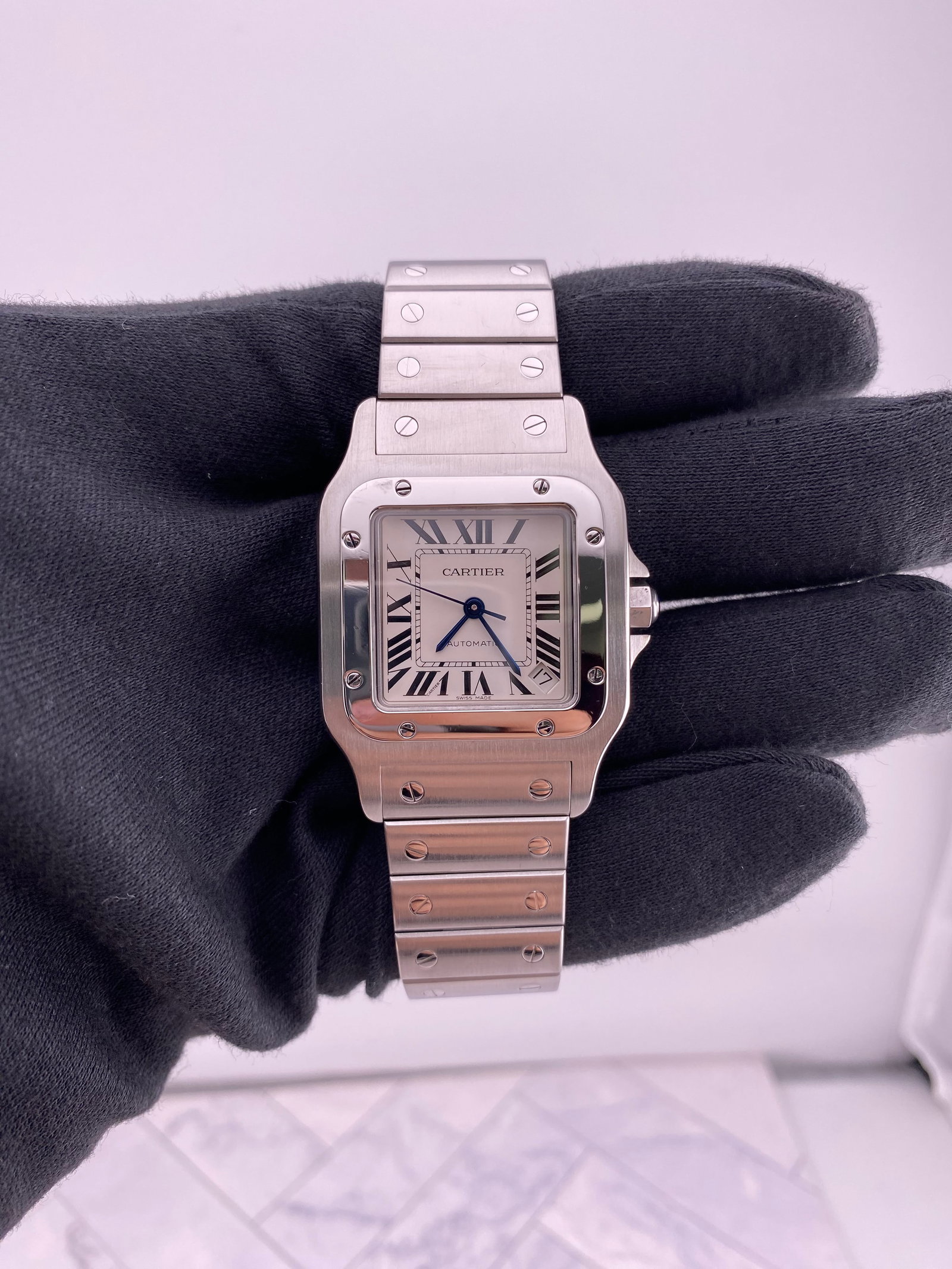 Cartier Ref. 2823 Santos Watch with Silver Dial 32mm SS: Cartier Ref. 2823 Santos Watch with Silver Dial 32mm SS Cartier Santos wristwatch featuring a silver dial and reference 2823. This watch is presented in excellent condition. Specifications Brand: Cart