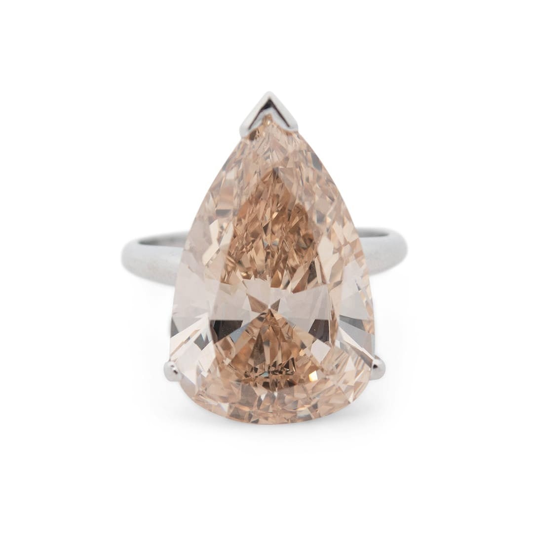 GIA Certified 11.35 Ct Pear Fancy Yellow Brown Diamond Ring 14K White Gold: GIA Certified 11.35 Ct Pear Fancy Yellow Brown Diamond Ring 14K White Gold This vintage ring features an impressive 11.35 carat natural fancy yellow brown pear brilliant diamond, certified by GIA and 