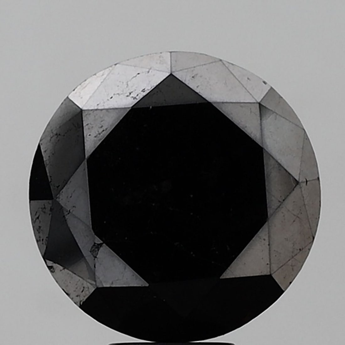 Loose Diamond - ROUND 10.48ct Fancy Black VS1: Loose Diamond - ROUND 10.48ct Fancy Black VS1 Source: Natural Shape: ROUND Carats: 10.48 Color: Fancy Black Certification: NONE Video:
