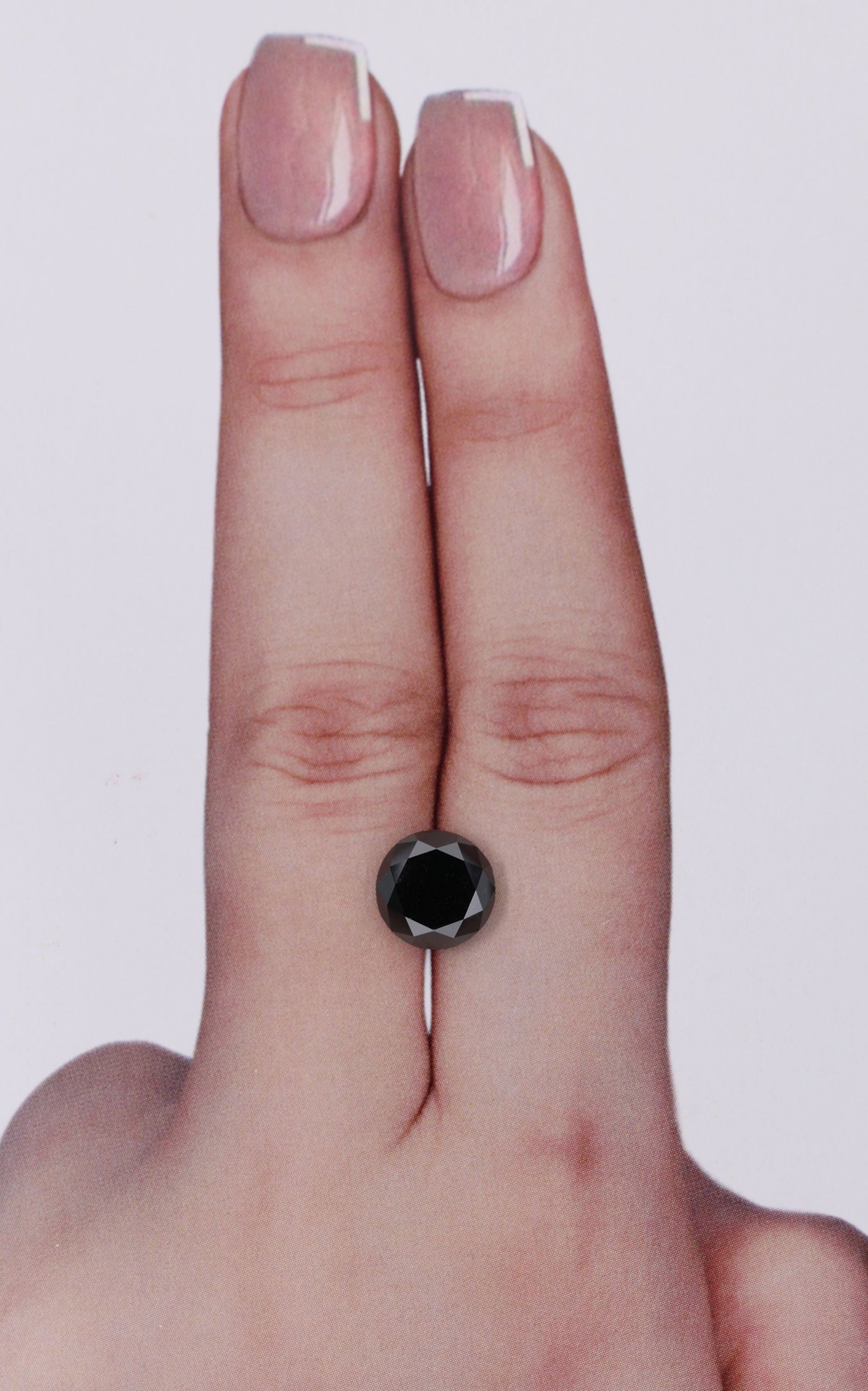 Loose Diamond - ROUND 2.74ct Black: Loose Diamond - ROUND 2.74ct Black Source: Natural Shape: ROUND Carats: 2.74 Color: Black Certification: IGI Video: