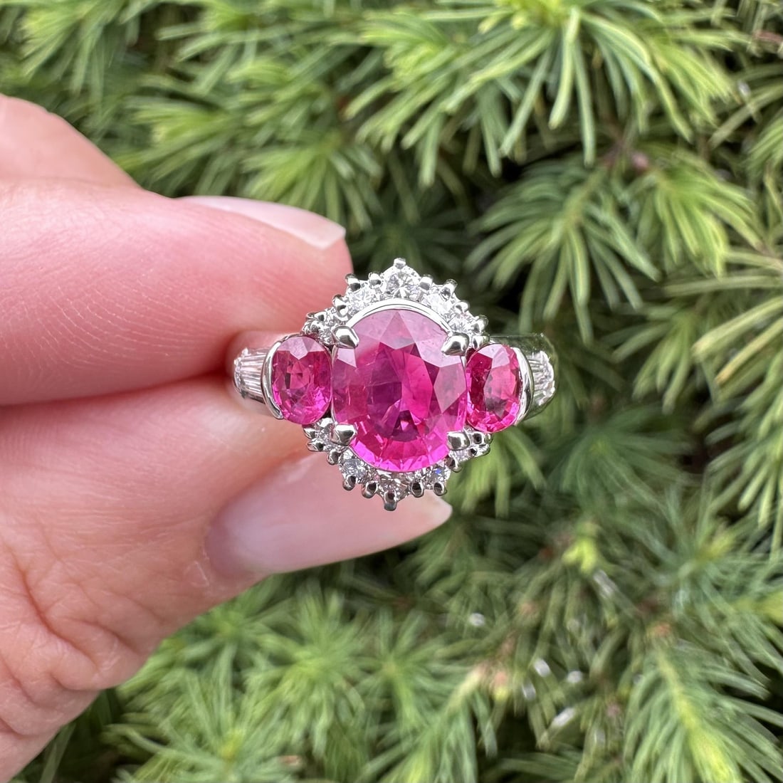 GIA Certified Burma Ruby Diamond Ring in Platinum 2.15ctw: GIA Certified Burma Ruby Diamond Ring in Platinum 2.15ctw Women's platinum ring set with three natural rubies and 14 natural diamonds. The rubies include an oval center stone with bright purple-red co
