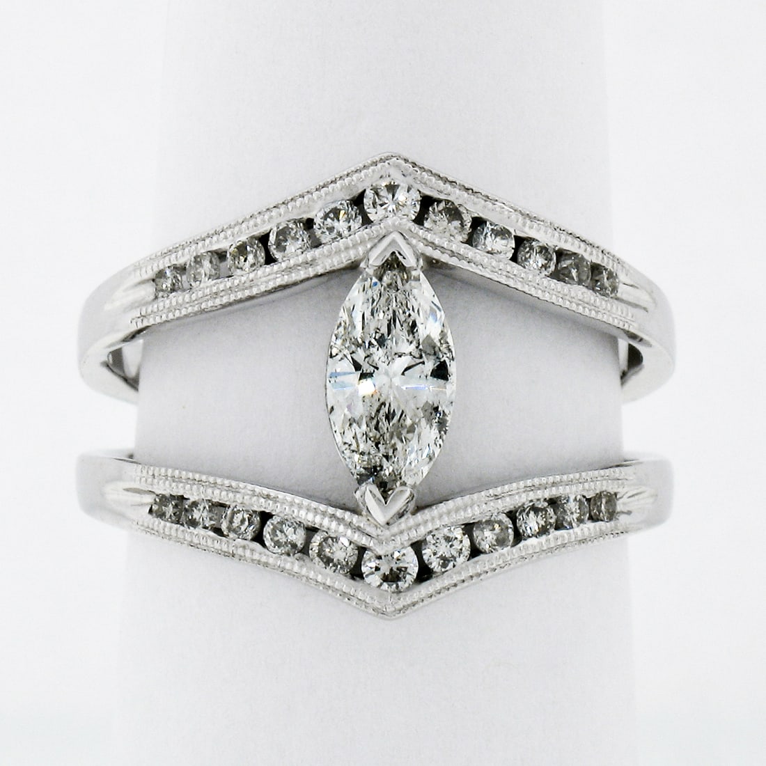 14K White Gold 1.01ct Marquise Round Diamond Milgrain Split Ring: 14K White Gold 1.01ct Marquise Round Diamond Milgrain Split Ring This exquisite cocktail ring is crafted from solid 14K white gold and showcases a stunning array of diamonds totaling approximately 1.0