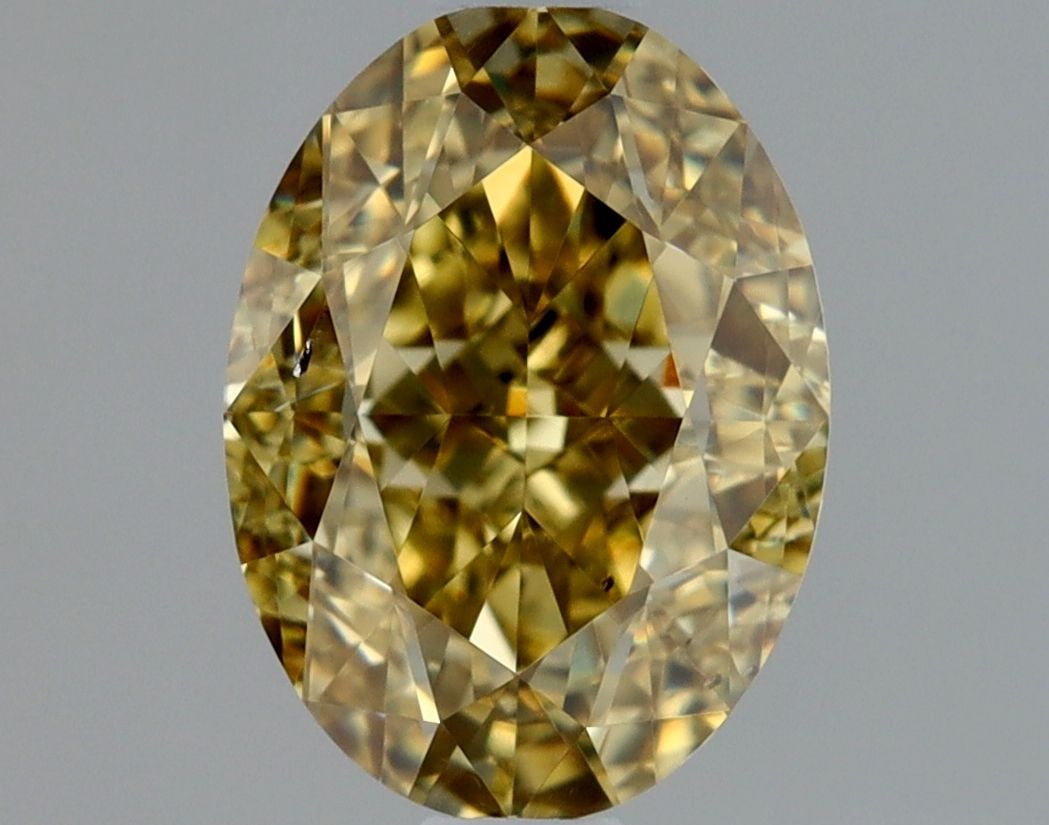 Loose Diamond - OVAL 1.01ct Fancy Deep Brownish Yellow SI2: Loose Diamond - OVAL 1.01ct Fancy Deep Brownish Yellow SI2 Source: Natural Shape: OVAL Carats: 1.01 Color: Fancy Deep Brownish Yellow Certification: GIA Video: