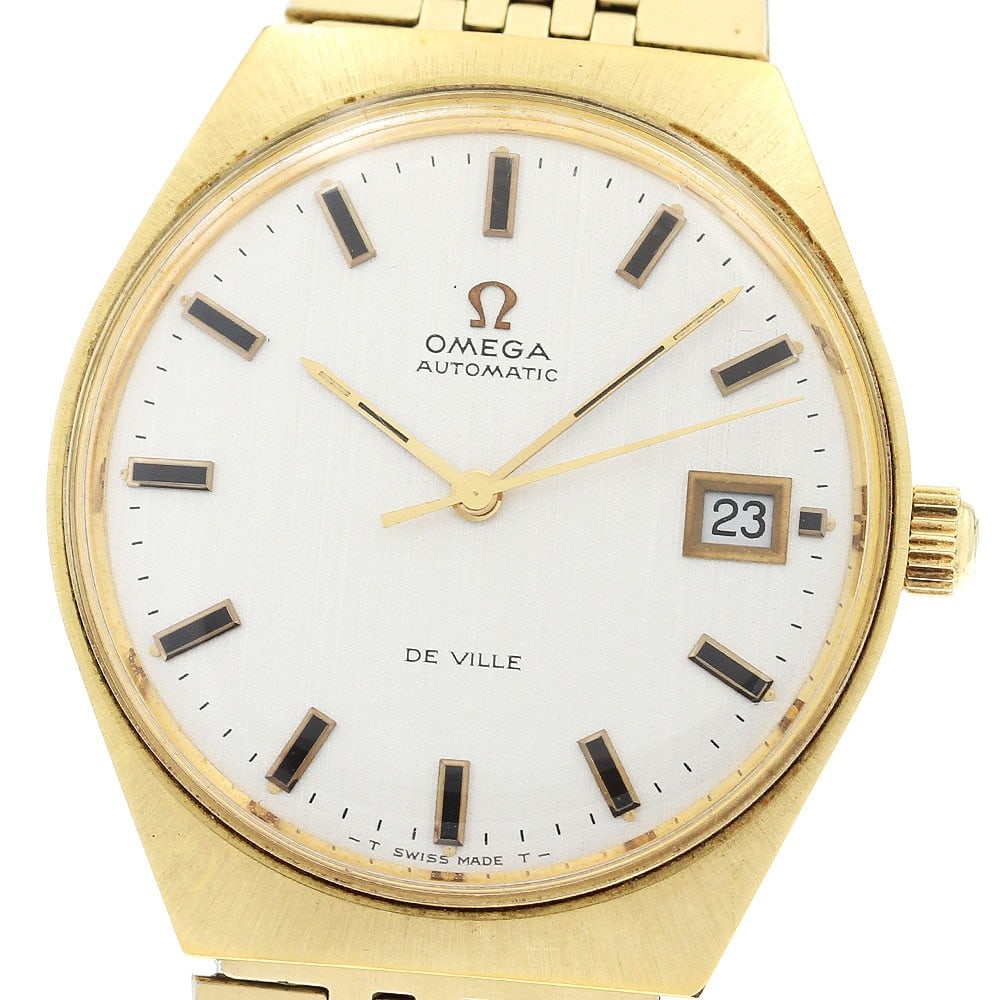 Omega De Ville Automatic Date Men's Wristwatch: Omega De Ville Automatic Date Men's Wristwatch This Omega De Ville Date men's wristwatch features a stainless steel and gold-plated case and bracelet, complemented by a silver dial. The watch is power