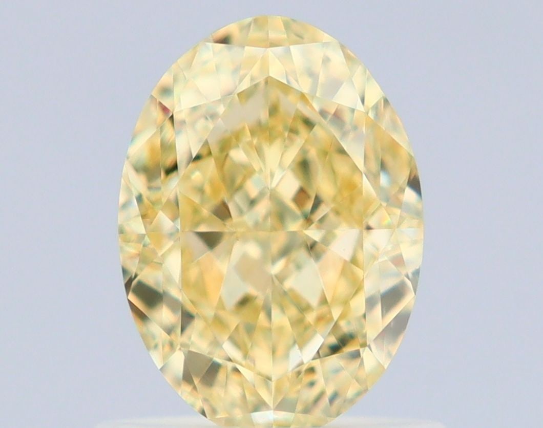 Loose Diamond - OVAL 1.05ct Fancy Yellow VVS2: Loose Diamond - OVAL 1.05ct Fancy Yellow VVS2 Source: Natural Shape: OVAL Carats: 1.05 Color: Fancy Yellow Certification: GIA Video:
