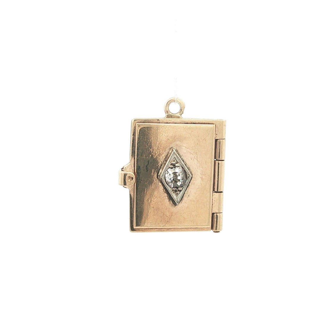 Art Deco 13-14k Yellow Gold Book Charm Pendant with 0.10ct Diamond: Art Deco 13-14k Yellow Gold Book Charm Pendant with 0.10ct Diamond Antique Art Deco rectangular open booklet book charm pendant with a natural old mine cut diamond in a pave setting. Crafted in solid 