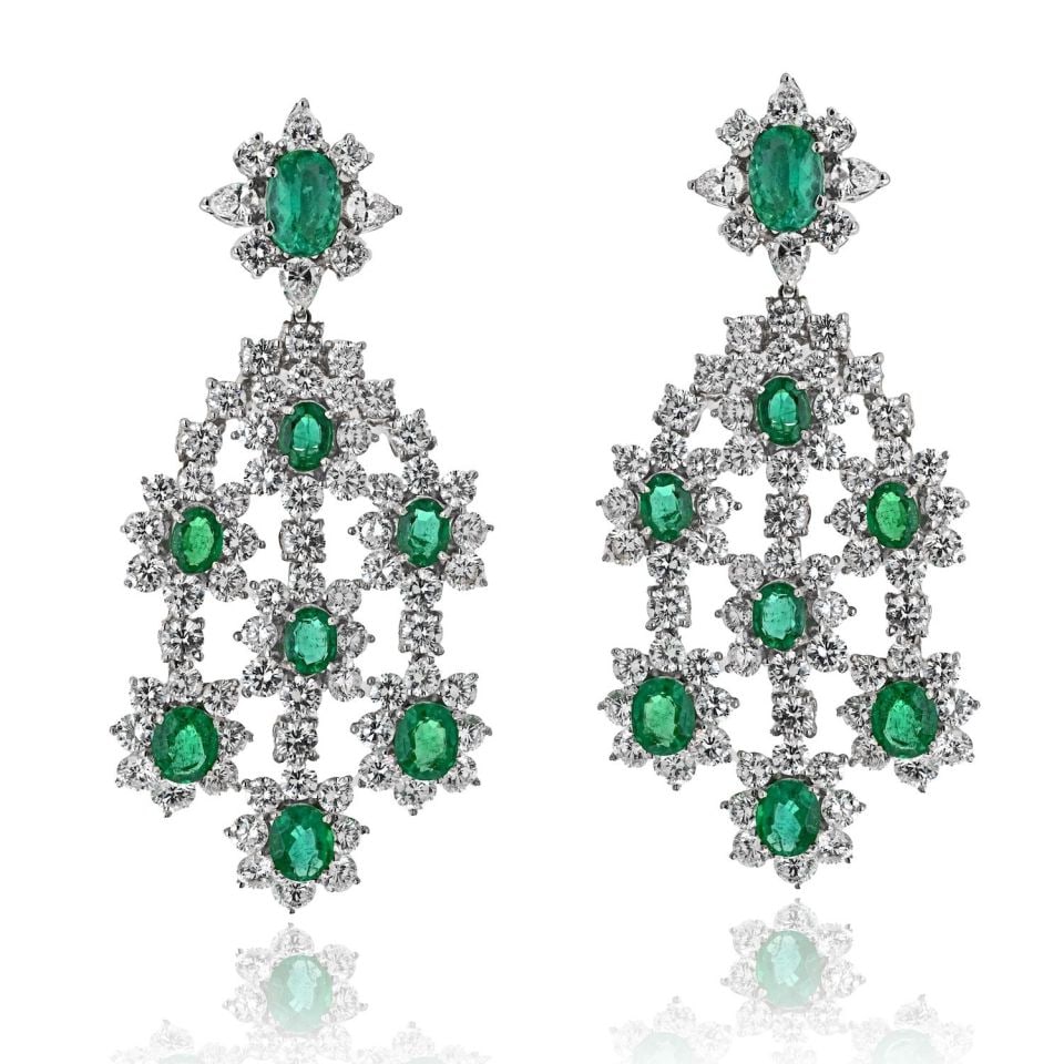 18K White Gold Chandelier Earrings 20 Carat Diamonds Green Emeralds: 18K White Gold Chandelier Earrings 20 Carat Diamonds Green Emeralds Elevate your elegance with these stunning 18K White Gold Chandelier Earrings, featuring 16 exquisite oval-cut green emeralds and rou