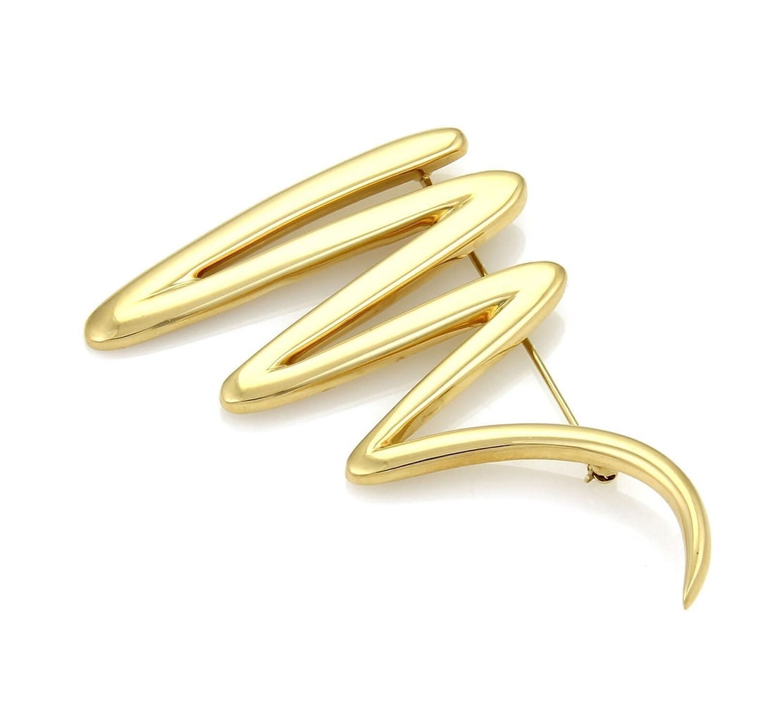 Tiffany Co Paloma Picasso Zig Zag 18k Gold Geometric Brooch: Tiffany Co Paloma Picasso Zig Zag 18k Gold Geometric Brooch Pre-owned Tiffany & Co. Paloma Picasso Zig Zag brooch from the Zig Zag collection. Crafted in 18k yellow gold, this sculptural geometric des