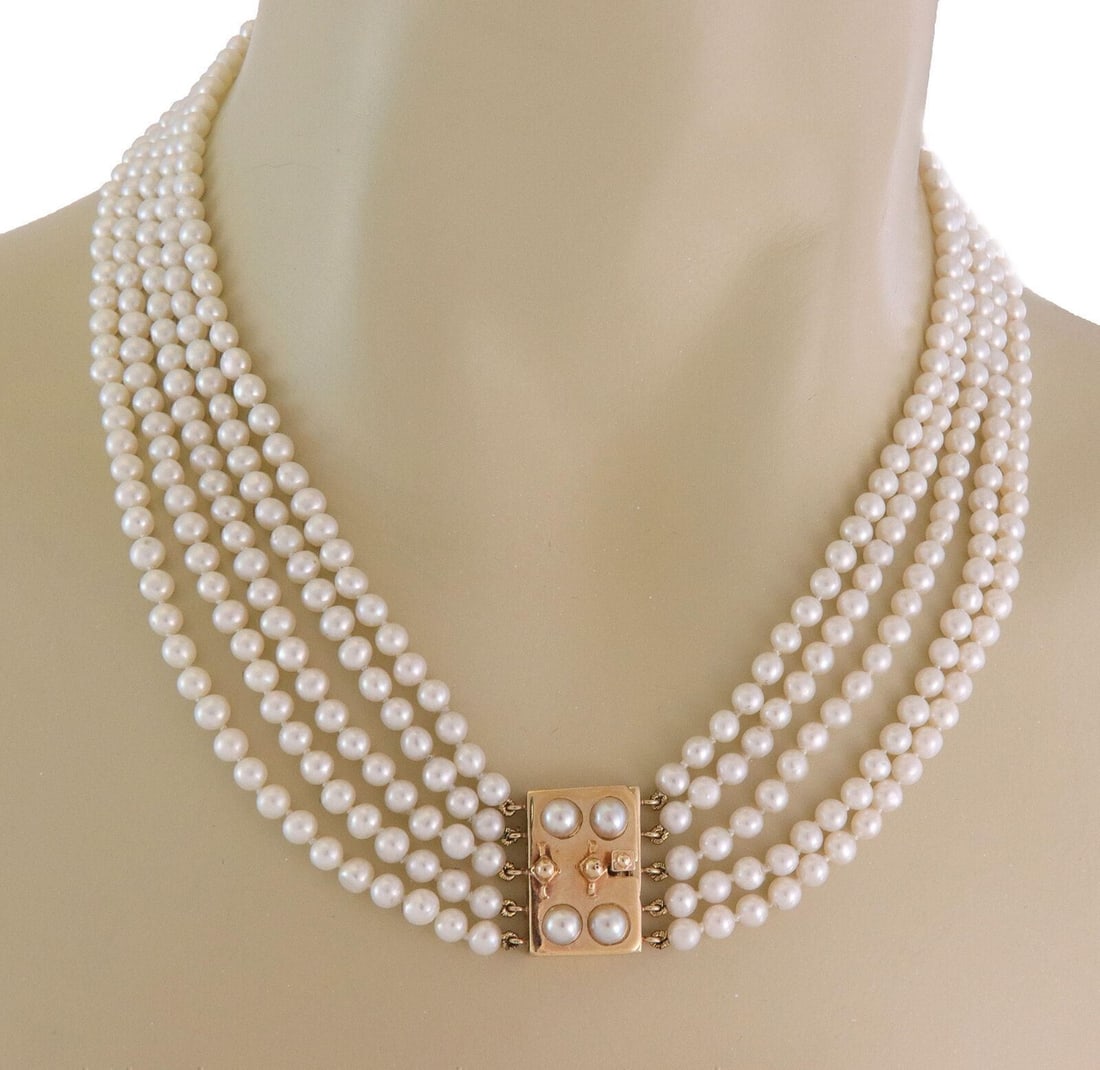 Vintage 5 Strand Cultured Pearl Necklace with 14k Yellow Gold Clasp 17.25": Vintage 5 Strand Cultured Pearl Necklace with 14k Yellow Gold Clasp 17.25" Vintage multi-strand cultured pearl necklace featuring five strands of cultured freshwater pearls and a decorative 14k yellow