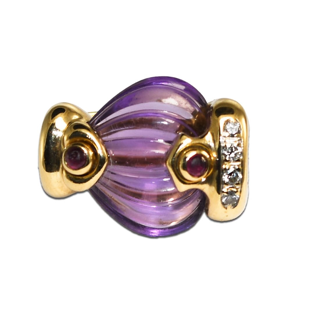 Asymmetrical 18K Gold Cocktail Ring with Amethyst and 4 Diamonds: Asymmetrical 18K Gold Cocktail Ring with Amethyst and 4 Diamonds Pre-owned 18k yellow gold cocktail ring featuring an asymmetrical purple amethyst with engraved surfaces and round brilliant cut