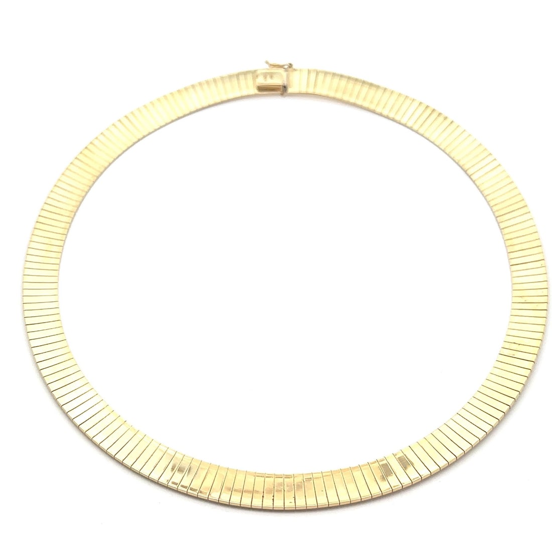 Vintage 14k Yellow Gold 16 Inch Flexible Omega Link Necklace: Vintage 14k Yellow Gold 16 Inch Flexible Omega Link Necklace Discover the elegance of this Vintage Italian Omega Link Chain Necklace, crafted from solid 14k yellow gold. This flexible chain features a