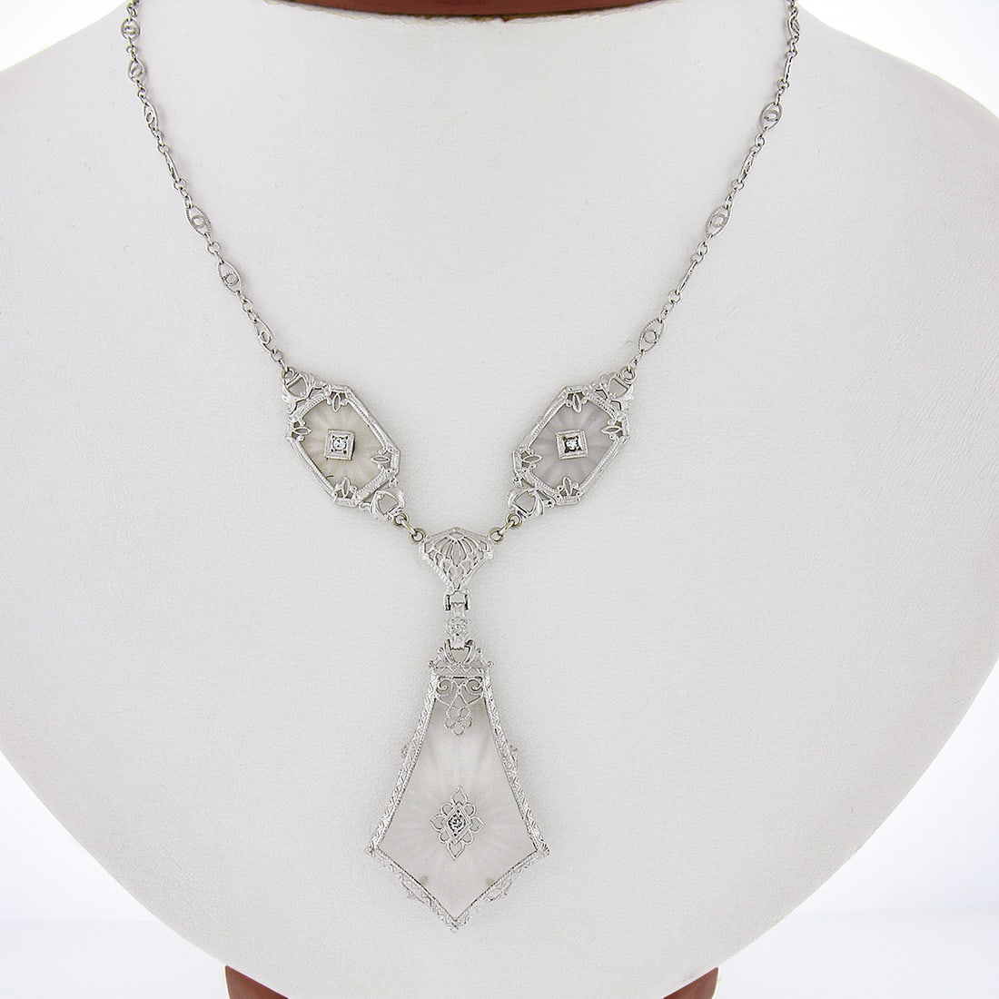 Art Deco 14K White Gold Necklace with Camphor Glass Diamond Filigree Pendant: Art Deco 14K White Gold Necklace with Camphor Glass Diamond Filigree Pendant Antique Art Deco pendant necklace in solid 14k white gold featuring three camphor glass panels, each accented with a natura